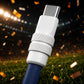 Close-up of white heavy-duty USB-C connector with stadium background