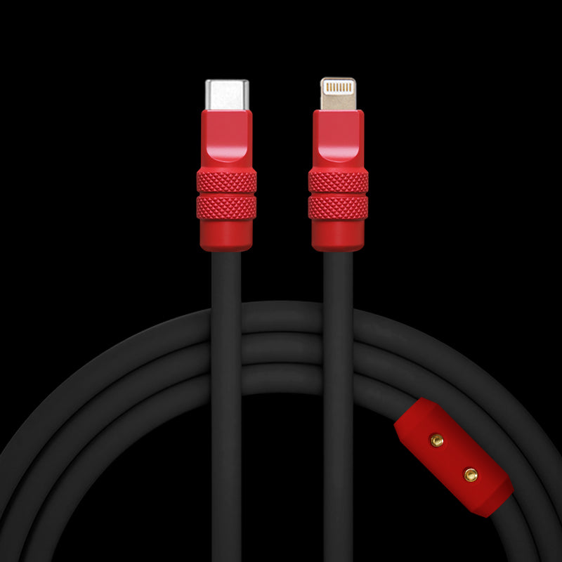 Coiled black USB-C to Lightning cable with red textured connectors