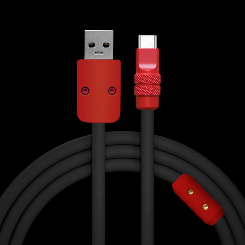 Coiled black USB-A to USB-C charging cable with red metal housing