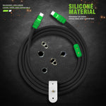 Coiled black silicone charger cable with green details on a dark background.