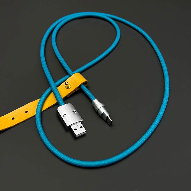Blue braided USB to Type-C cable on dark background.
