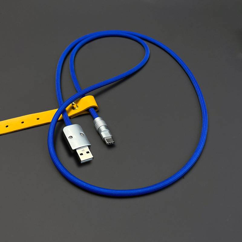 Dark blue braided USB to Type-C charging cable with yellow leather strap.