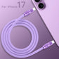 Top view of coiled purple 240W silicone fast charging cable with anodized connectors, product shot. C to C