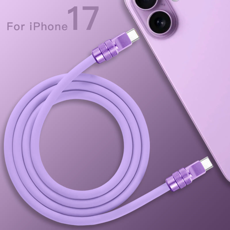 Top view of coiled purple 240W silicone fast charging cable with anodized connectors, product shot. C to C