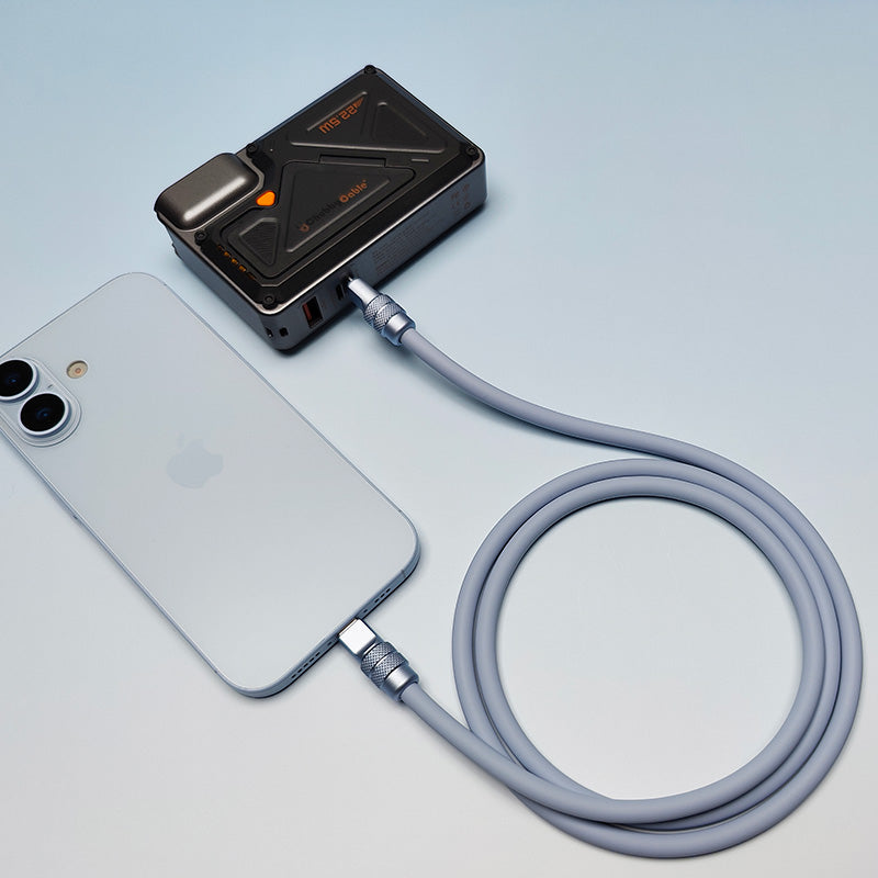 Silver grey 240W silicone cable charging an iPhone from a black magnetic power bank.