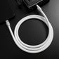 White silicone type-c fast charging cable connected to phone and power bank.