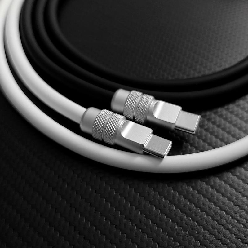 Close-up of black and white USB-C cables with premium metal connectors.