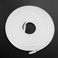 White USB-C to Lightning charging cable coiled