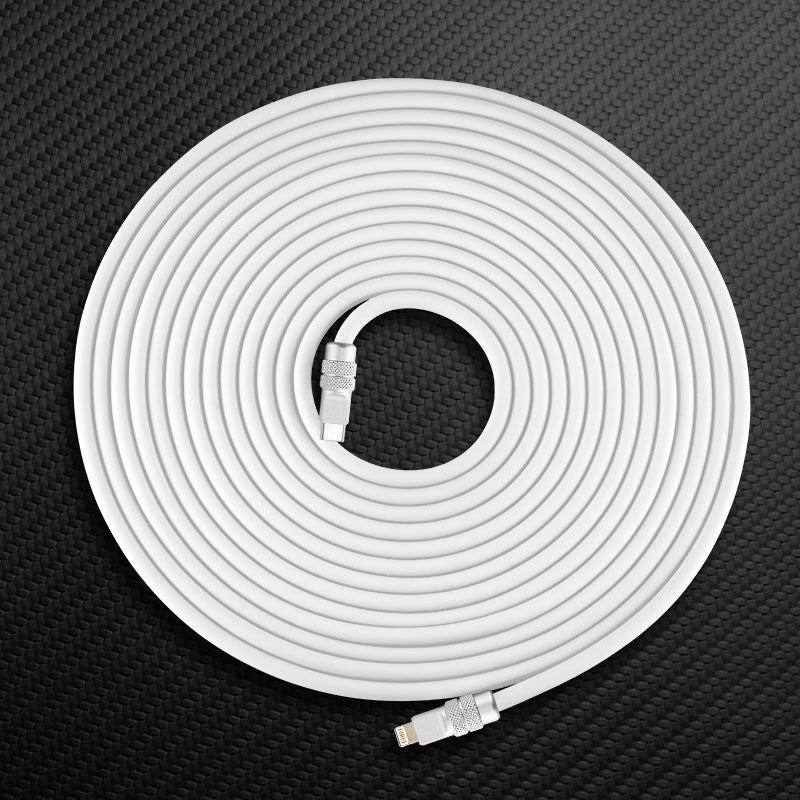White USB-C to Lightning charging cable coiled