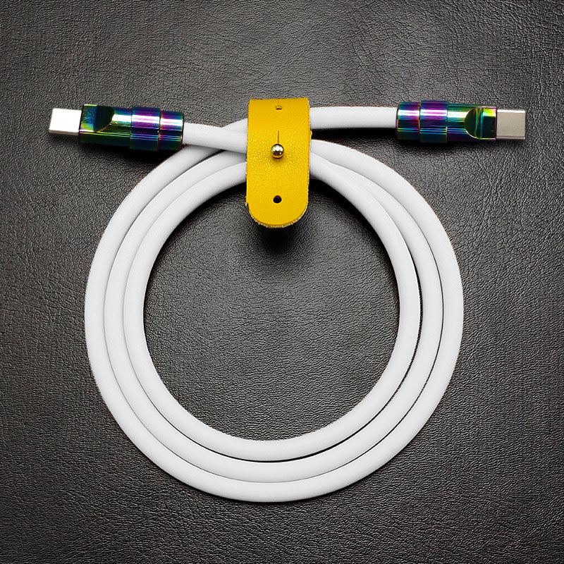 Coiled white silicone USB-C to USB-C cable featuring rainbow oil-slick finish.