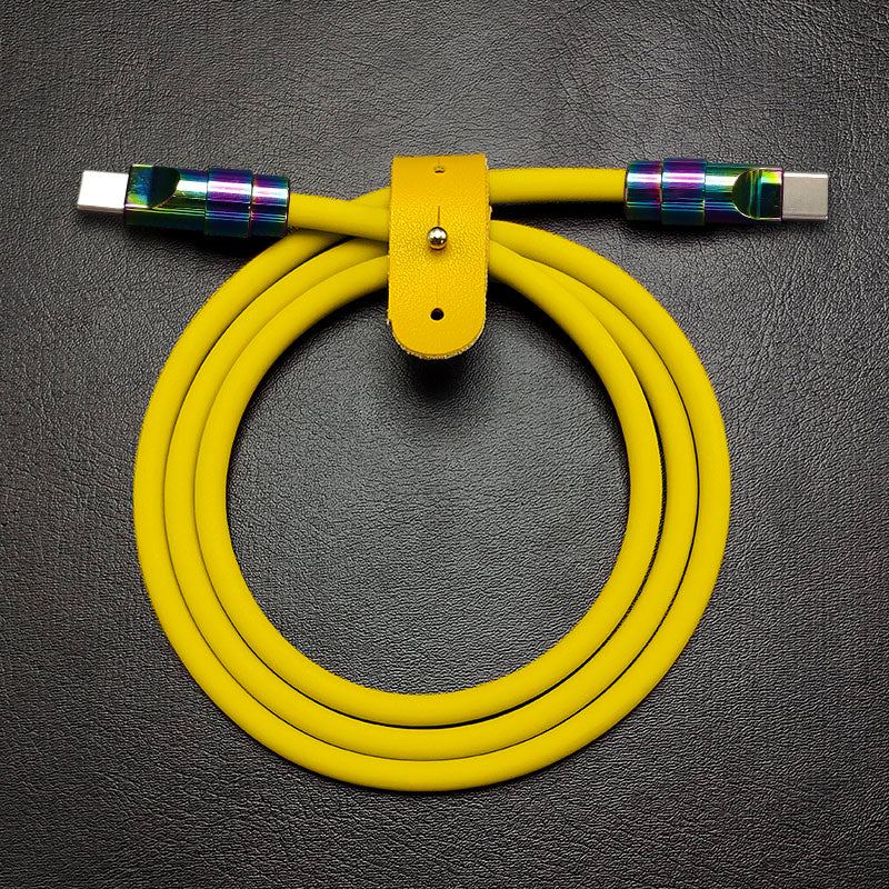 Yellow silicone USB-C to USB-C fast charging cable with rainbow zinc alloy connectors.