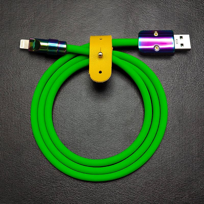 Green silicone USB to Lightning charging cable with metallic rainbow housings.