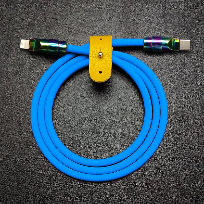 Coiled light blue Chubby Cable Lightning to USB-C with yellow leather strap