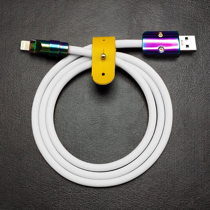 Flexible white silicone USB to Lightning cable with yellow organizer strap.