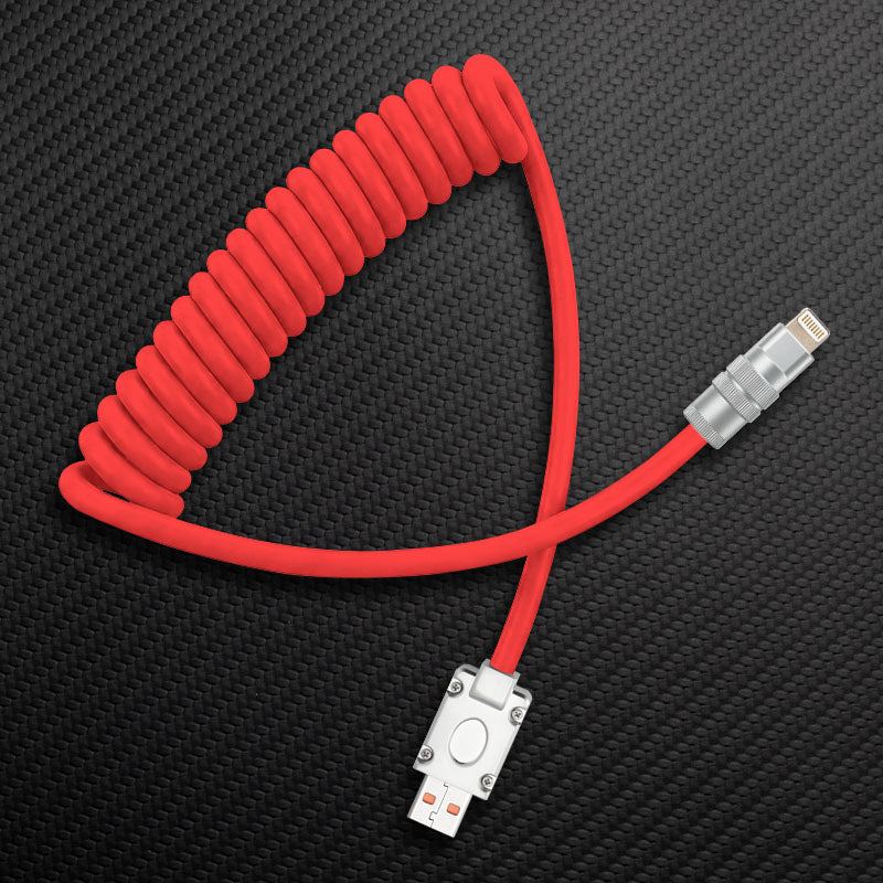 Red coiled lightning to USB cable on black background