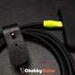 Close up of black braided Chubby Cable with yellow connector charging a smartphone