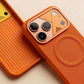 Close-up of orange phone case interior and camera housing.