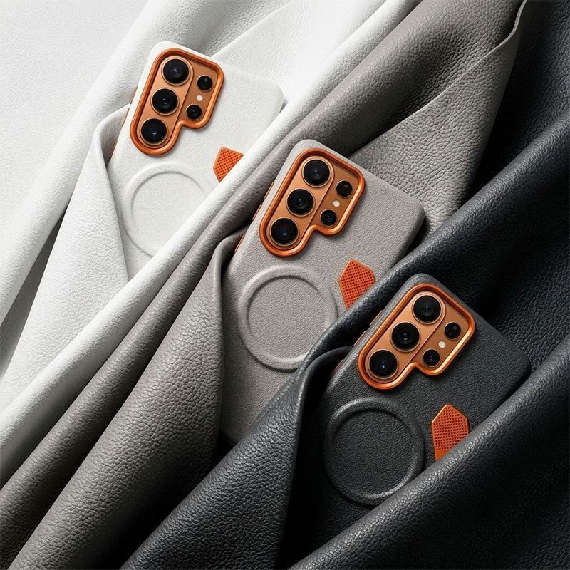 Assortment of black, grey, and white leather-textured phone cases with orange trim.