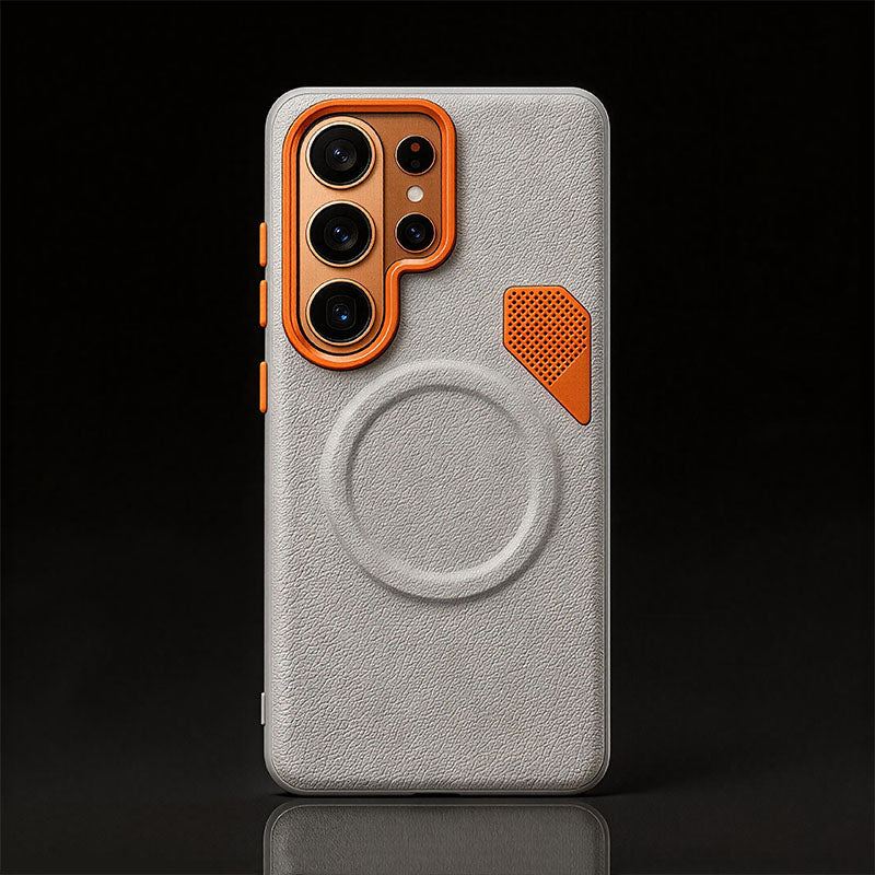 White leather-textured phone case with orange camera bumper and magnetic ring.