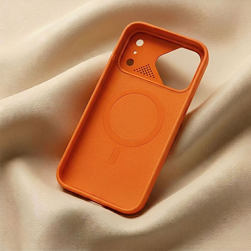 Inside view of an orange magnetic smartphone case with interior texture.