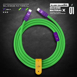 Coiled green silicone flash charging cable with yellow leather strap