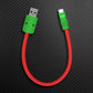 Red silicone short USB A to USB C cable with green connectors.