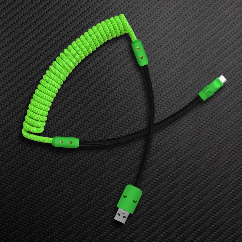 Lime green coiled mechanical keyboard cable with black extension and USB-A to Type-C connectors.