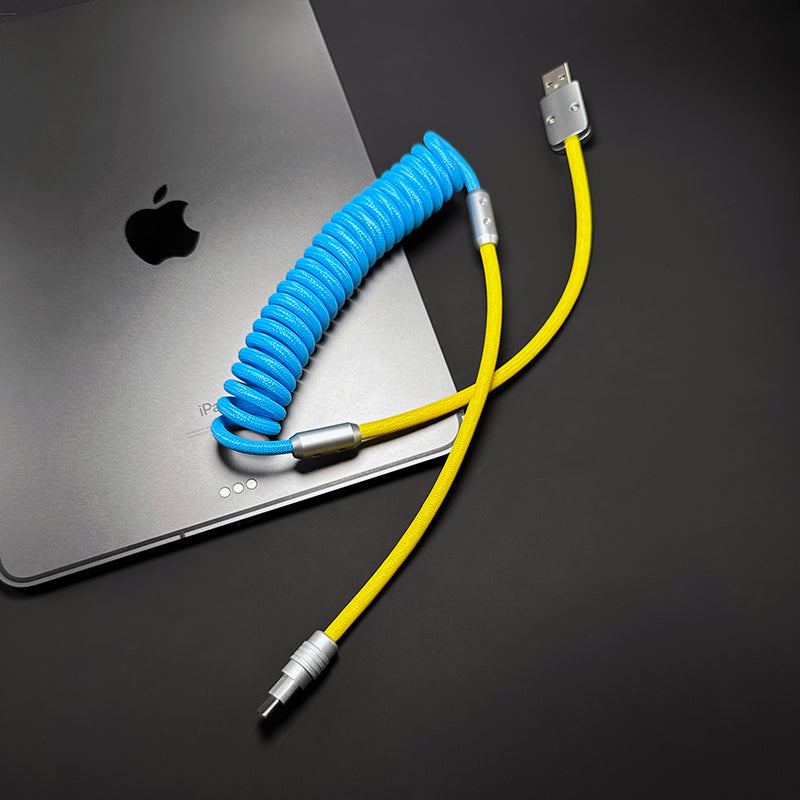 Blue and yellow ChubbyCable coiled charging cable