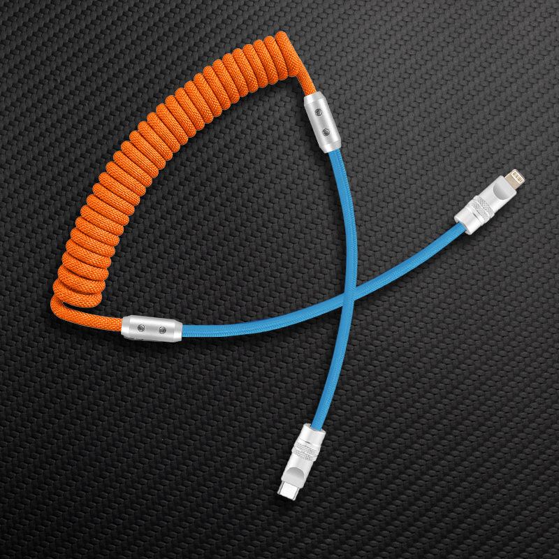 Orange coiled USB-A to Lightning cable