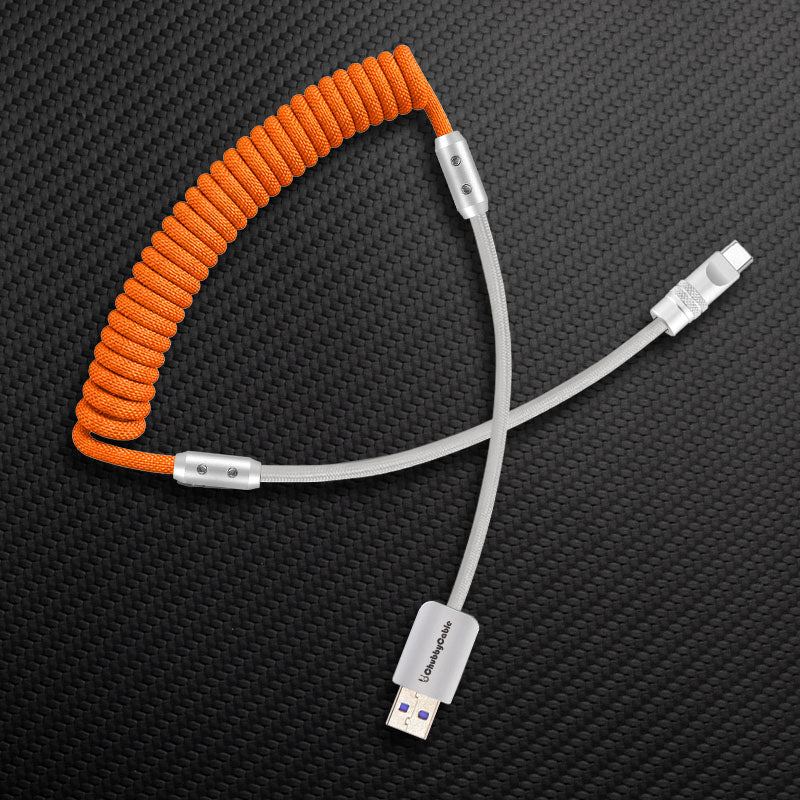 Orange coiled USB-A to USB-C cable