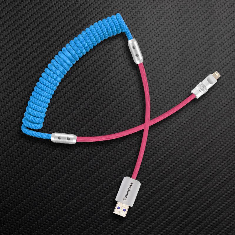 Blue and pink coiled USB-A to Lightning cable