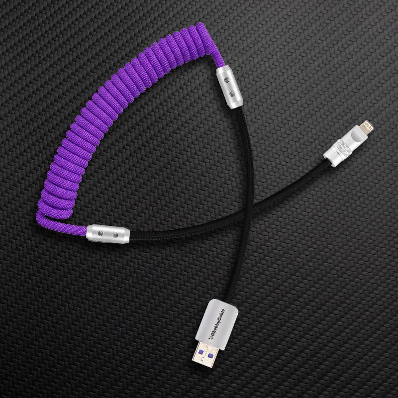 Purple and black coiled USB-A to Lightning cable