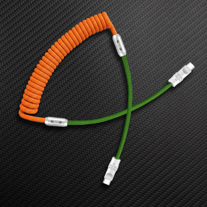 Orange and green coiled USB-C to USB-C charging cable