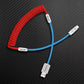 Red coiled cable with blue extension, USB-C connector