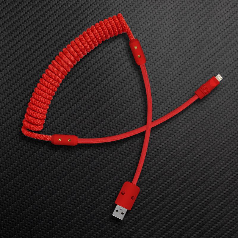 Red coiled custom mechanical keyboard cable with USB-A to Lightning connectors.