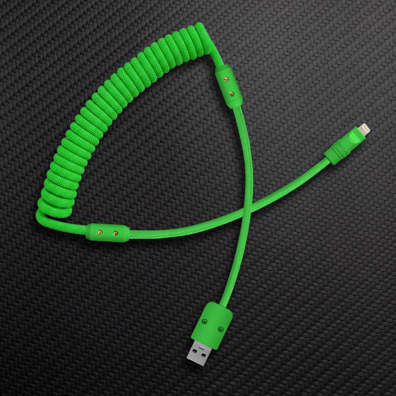 Green coiled custom mechanical keyboard cable with USB-A to Lightning connectors.