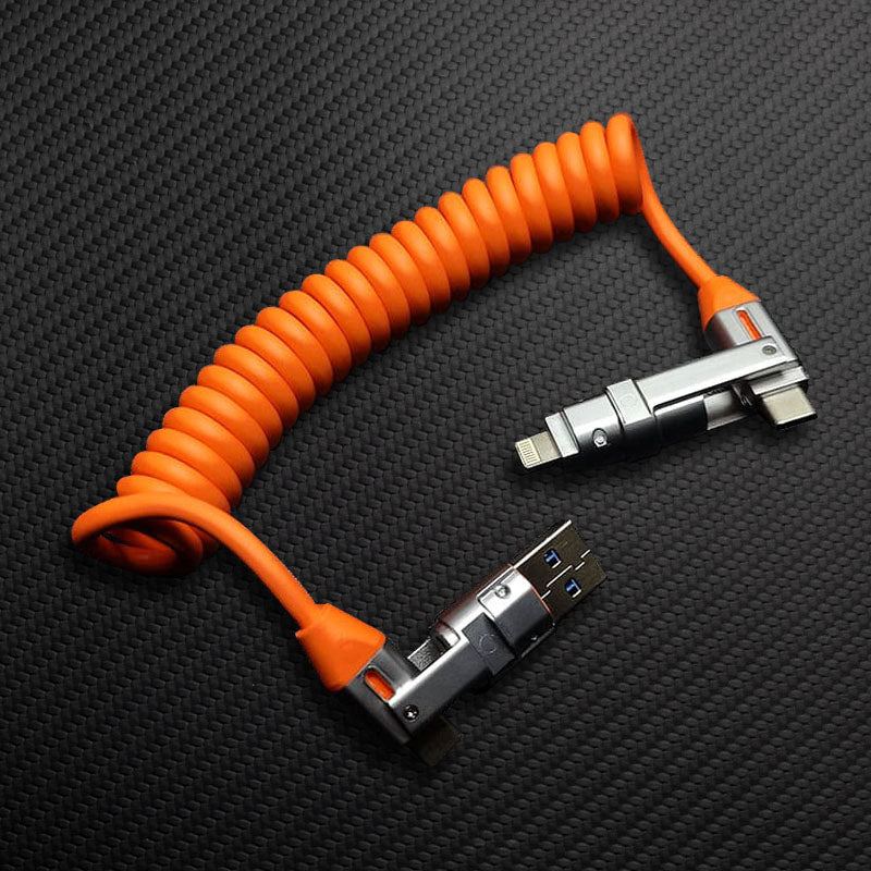 Orange coiled multi-connector charging cable on textured black background.
