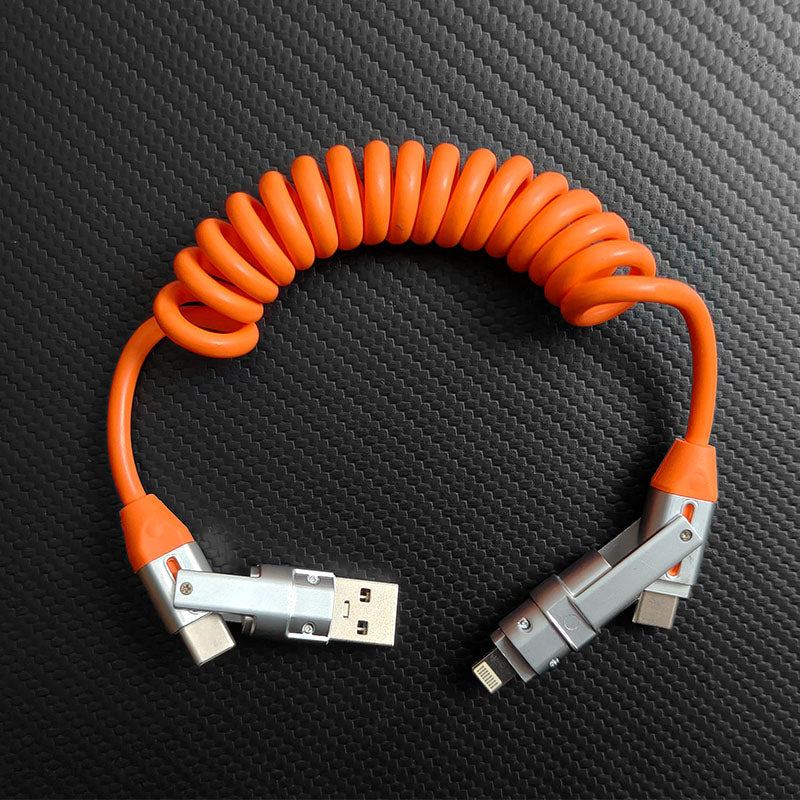 Retractable orange coiled cable with adjustable USB-A, C, Lightning, and Micro-USB tips.