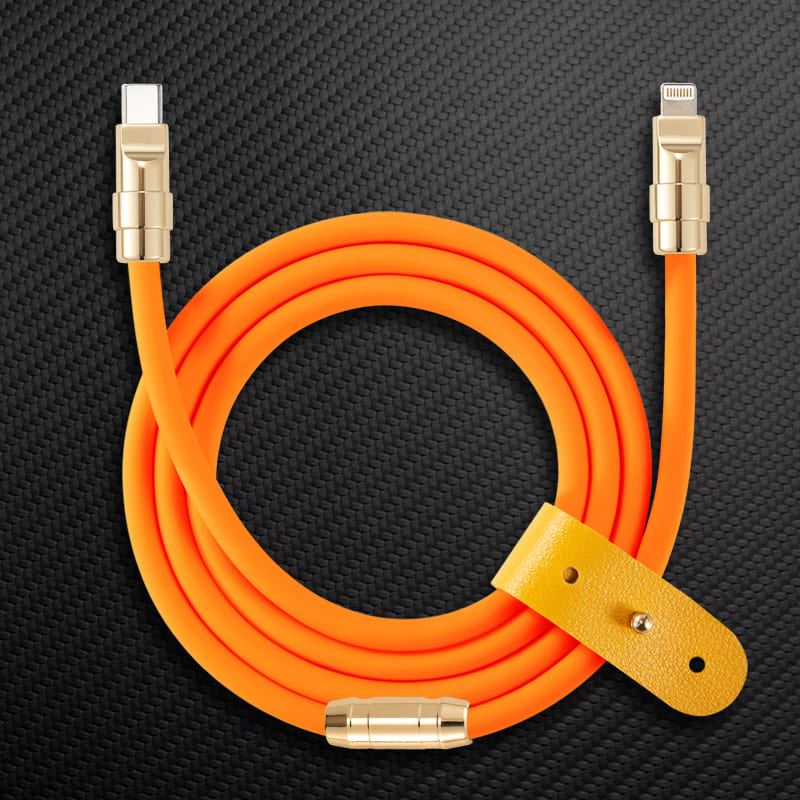 Orange USB-C to Lightning cable with gold connectors and leather strap