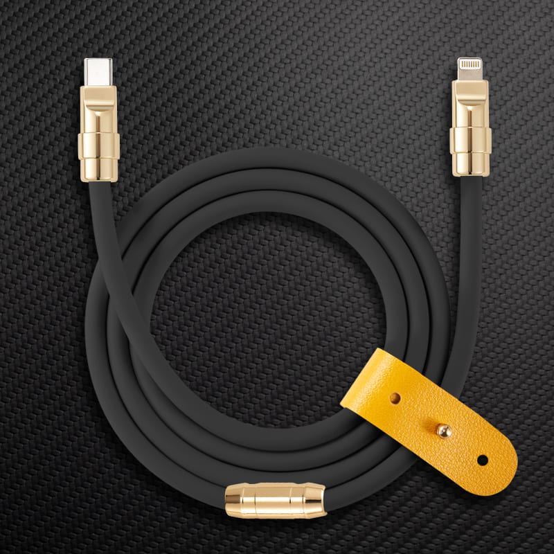 Black USB-C to Lightning cable with gold connectors and yellow leather strap