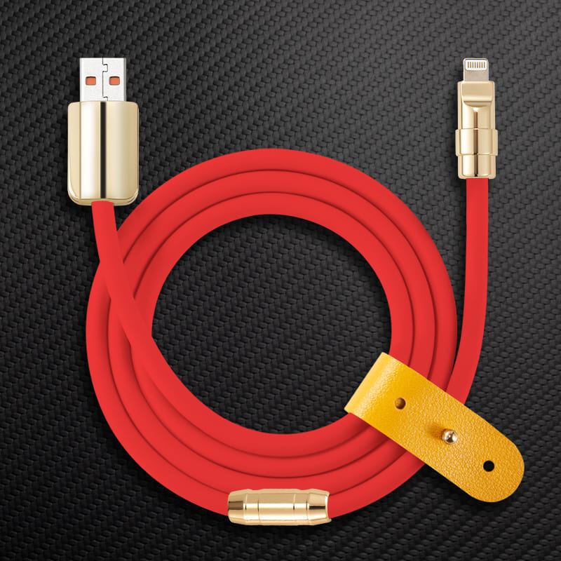 Red flexible charging cable with gold connectors and cable tie.