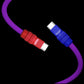 Close-up of purple silicone cable showing red and blue knurled metal USB-C tips.