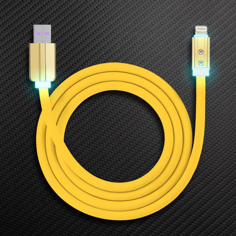 Yellow silicone USB to Lightning charging cable with glowing LED connectors.
