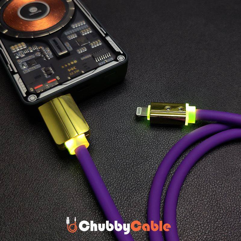 Purple Chubby Cable with LED indicator connected to a power bank