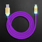 Purple USB-A to Lightning phone charger cable with illuminated gold heads.