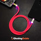 Pink Chubby Cable glowing LED charging cord connected to phone and power bank.