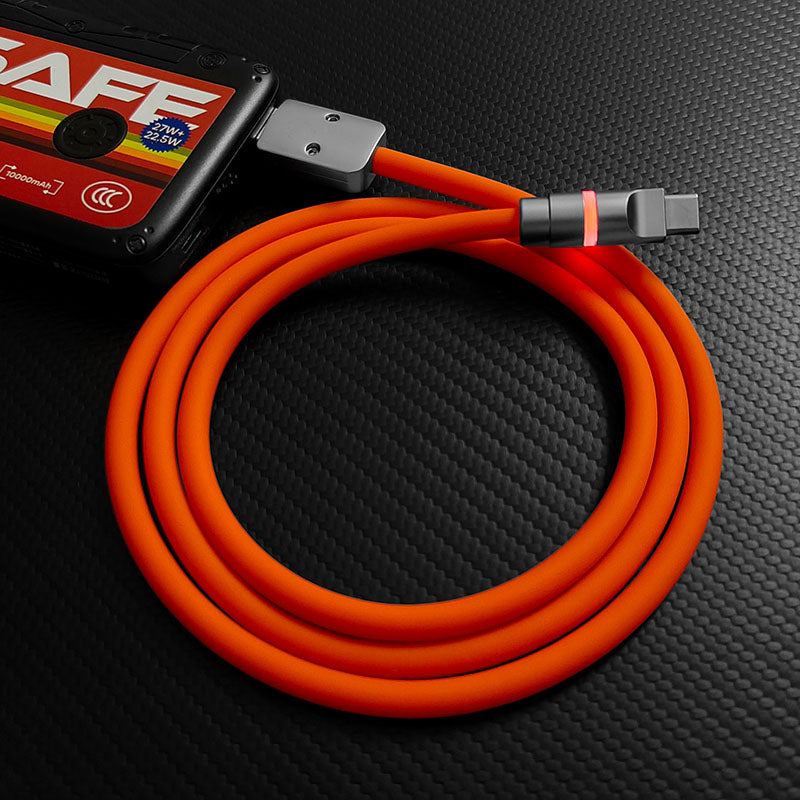 Bright orange silicone fast charging cable with red connector light