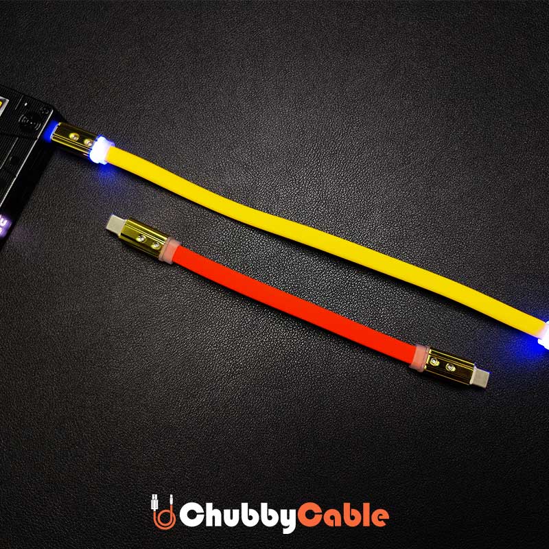 Long yellow and short red flat silicone charging cables with glowing LED lights