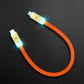 Orange short flat USB C to Lightning silicone charging cable with LED light