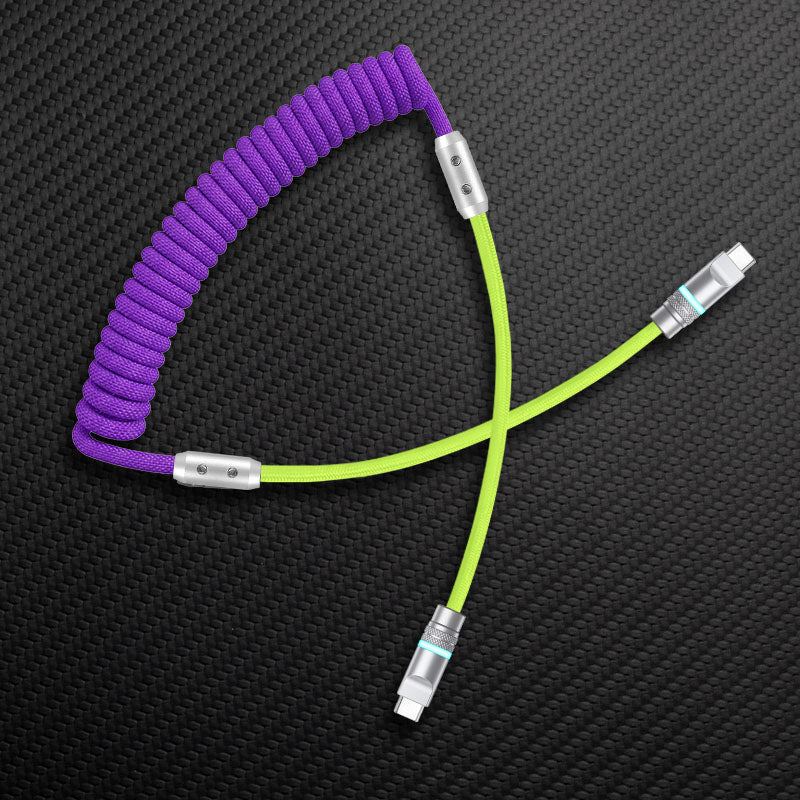 Purple coiled cable with lime green straight segment and USB-C to USB-C connectors